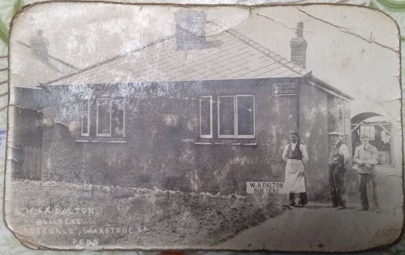Rosedale, Warstones Road, Penn, Wolverhampton -- a house built by W.A. Dalton Builders, with the W.A. Dalton Builders sign displayed on the finished building and three men standing outside.